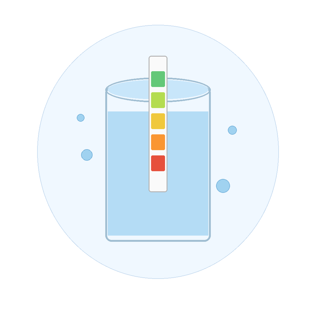 water hardness test strip dipped in a glass of water with color gradient pads